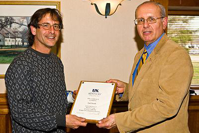 Dr. Paul Vincelli, Extension Professor, is recognized for his Twenty Years of Service to Extension. The award was presented by Dr. Jimmy Henning, Associate Dean for Extension, at the Kentucky Association of State Extension Professionals (KASEP), March 2011.  (Photo: Steve Patton, UK)