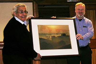Dr. Said A. Ghabrial, Professor, is honored upon his retirement, December 2013. Presenting the gift is Dr. Christopher L. Schardl, Professor and Department Chair. (Photo: Cheryl Kaiser, UK)