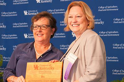 Ms. Shirley Harris, Administrative Services Assistant Senior and Office Manager in the Department of Plant Pathology, received the 2016 College of Agriculture, Food and Environment Outstanding Staff Award in the "Office/Clerical-on campus" category. Presenting the award at Ag Round-up is  Dr. Nancy Cox, Dean of the College of Agriculture, Food Environment. (Photo: Matt Barton, UK) 
